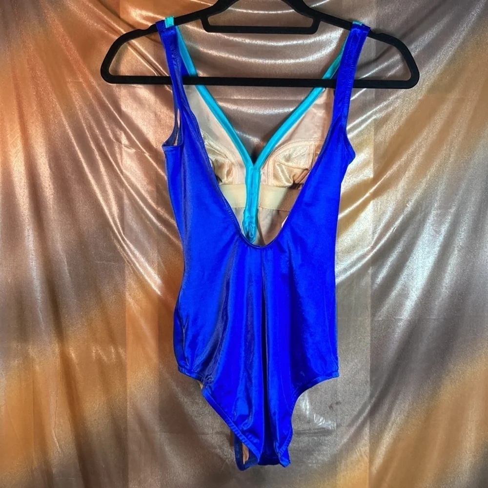 VINTAGE 80’ bright blue and turquoise swim suit. High cut 159 32” chest‎ small